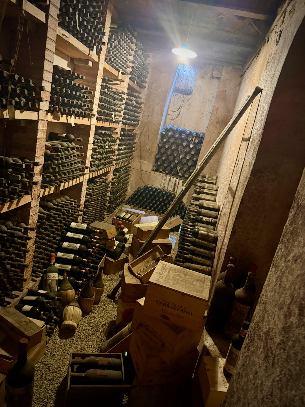 Racks of old dusty bottles in the Verrazzano cellar